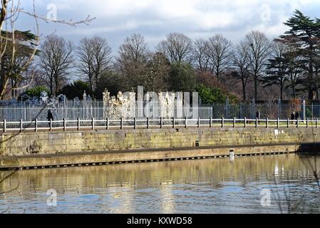 Ornate Gold gates in Hampton Court Palace by the River Thames west London England UK Stock Photo