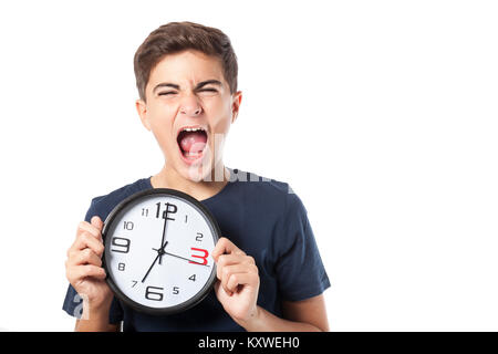 young boy holding watch and shouting Stock Photo