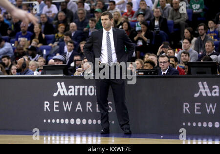 Boston Celtics head coach Brad Stevens, right, with his team during a ...