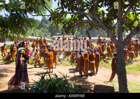 Children in uniforms playing in the cortyard of primary school in rural area near Arusha, Tanzania, Africa. Stock Photo