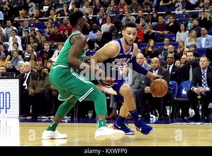 Philadelphia 76ers' Ben Simmons, left, shoots the ball as Minnesota ...