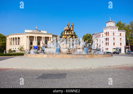 KUTAISI, GEORGIA - SEPTEMBER 25, 2015: Kolkhida Fountain and Georgian Drama Theatre Lado Meskhishvili in the center of Kutaisi, Georgia. Stock Photo