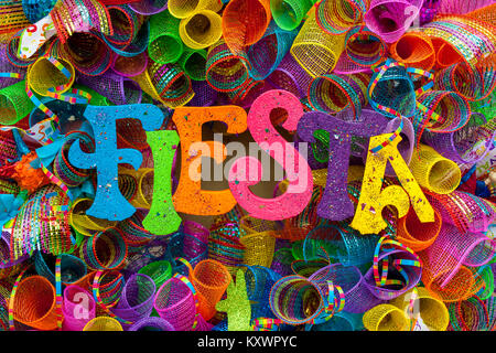 The word 'fiesta' written in colorful letters with glitter and multicolored mash Stock Photo