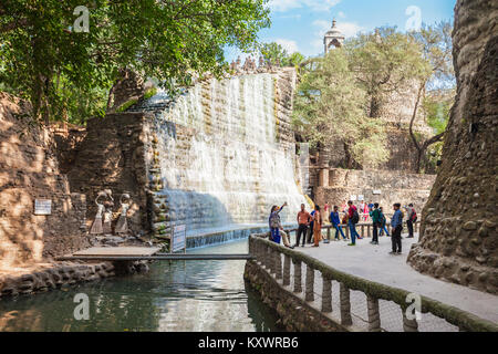 CHANDIGARH, INDIA - NOVEMBER 04, 2015: Waterfall in the Rock Garden of Chandigarh. It is a sculpture garden in Chandigarh, India, also known as Nek Ch Stock Photo