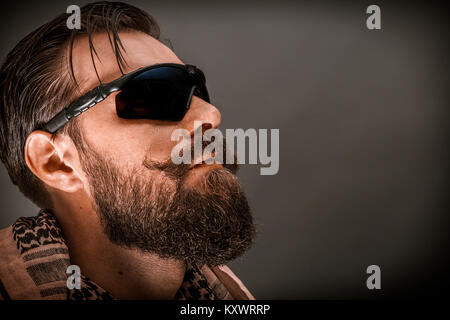 Bearded man wearing sunglasses. Stock Photo
