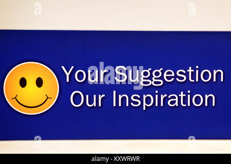 Close up yellow feedback button with smiley face Stock Photo