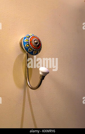 Close up metal hook for hanging clothes on wall Stock Photo