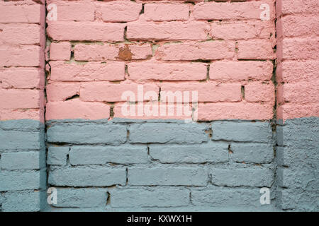Pink and gray painted brick wall detail Stock Photo