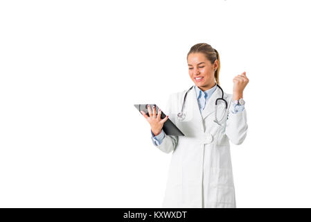 Pretty young female doctor with digital tablet isolated on the white background Stock Photo