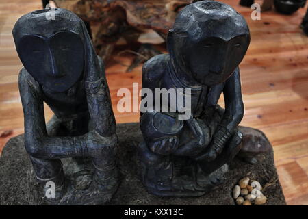 Banaue, Philippines-October 6, 2016: The Museum of Cordilleran Sculpture shows the art of the Cordillera region.s peoples and cultures. Couple of bulu Stock Photo