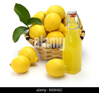 homemade limoncello, italian traditional lemon liqueur on white background Stock Photo