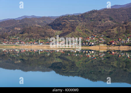 Reflection of village houses in Bosnia and Herzegovina. Stock Photo