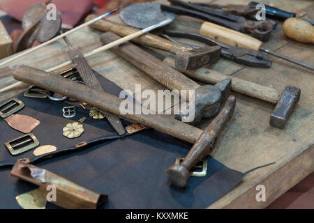 metalsmith tablewith tools in a workshop Stock Photo