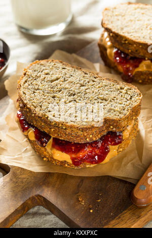 Sweet Homemade Gourmet Peanut Butter and Jelly Sandwich for Lunch Stock Photo