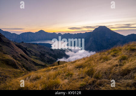 Volcano crater of Mount Rinjani. The mountain is in the Regency of North Lombok, West Nusa Tenggara and rises to 3,726m Stock Photo