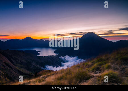 Volcano crater of Mount Rinjani. The mountain is in the Regency of North Lombok, West Nusa Tenggara and rises to 3,726m Stock Photo