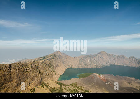 View from the summit of Mount Rinjani. The mountain is in the Regency of North Lombok, West Nusa Tenggara and rises to 3,726m Stock Photo