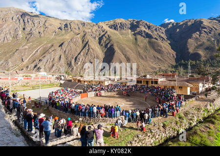 OLLANTAYTAMBO, PERU - MAY 24, 2015: Unidentified people are looking for corrida in Ollantaytambo, Peru. Stock Photo