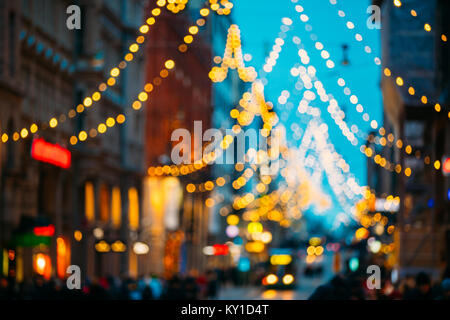 Helsinki, Finland. New Year Boke Lights Xmas Christmas Tree Decoration And Festive Illumination In Aleksanterinkatu Street. Natural Defocused Blue Bok Stock Photo