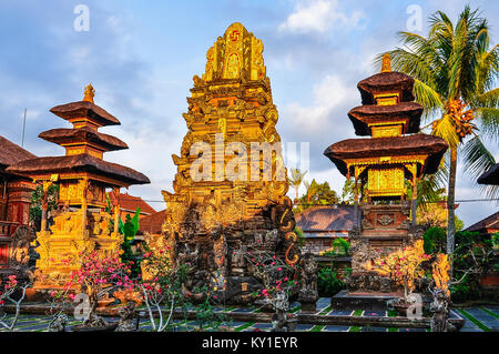 Sunset colors in Saraswati Temple in the town of Ubud, Bali Stock Photo