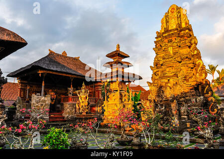 Sunset colors in Saraswati Temple in the town of Ubud, Bali Stock Photo