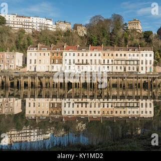 The Georgian terraced housing of Hotwells Rd in Bristol, reflected in the river Avon at high tide. Stock Photo