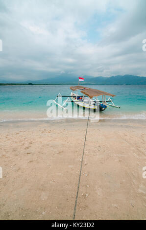 Beautiful beach at Gili Trawangan, or simply Gili T, is the largest of the three Gili Islands off Lombok. The island is one of the diving paradise. Stock Photo