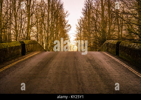 Looking over the bridge in Arundel during the glow of sunset Stock Photo