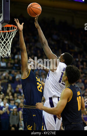 Seattle, WA, USA. 11th Jan, 2018. Cal Bear defender Kingsley Okoroh (22) attempts to block the shot of UW center Noah Dickerson (15) during a PAC12 basketball game between the Washington Huskies and Cal Bears. The game was played at Hec Ed Pavilion in Seattle, WA. Jeff Halstead/CSM/Alamy Live News Stock Photo