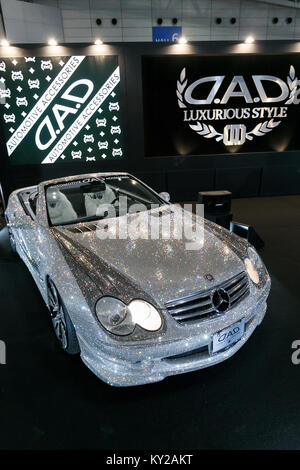 Chiba, Japan. 12th January, 2018. Car dress-up shop D.A.D displays a Mercedes-Benz SL600 decorated with Swarovski crystals at Tokyo Auto Salon 2018 on January 12, 2018, Chiba, Japan. Tokyo Auto Salon is one of the largest automobile exhibitions that showcasing the latest technological solutions and products to customize cars. The show runs from January 12 to 14 at Makuhari Messe International Convention Complex. Credit: Rodrigo Reyes Marin/AFLO/Alamy Live News Stock Photo