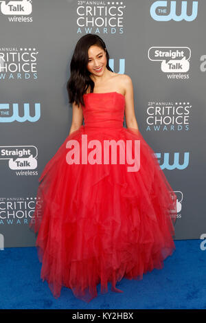 Constance Wu attends the 23rd Annual Critics' Choice Awards at Barker Hangar on January 11, 2018 in Santa Monica, California. Stock Photo