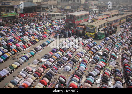 Tongi, Bangladesh. 12th Jan, 2018. The first phase of a three-day Bishwa Ijtema, the second largest congregation of the Muslims after hajj, began on Friday on the bank of the Turag River. Credit: Asif Ahmed/SOPA/ZUMA Wire/Alamy Live News Stock Photo