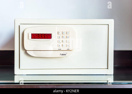safe with coded lock on the table in the hotel close-up Stock Photo