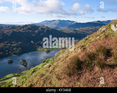 The Coniston Fells viewed across Rydal Water from Nab Scar on Heron Pike. Loughrigg Fell rises behind the lake. Near Ambleside, Cumbria Stock Photo