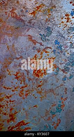 Flaking paint on metal background. Stock Photo