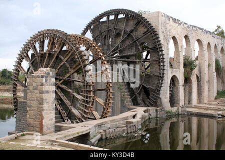 Big old noria on the river in Hama, Syria Stock Photo