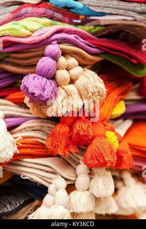 colorful covers for pillows on stack, close up Stock Photo