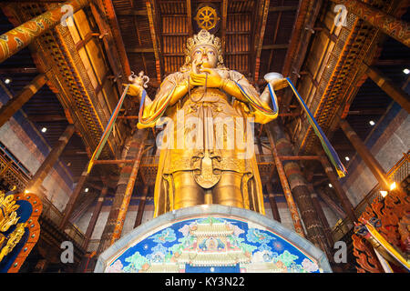 ULAANBAATAR, MONGOLIA - JULY 12, 2016: Avalokitesvara statue inside the Gandantegchinlen or Gandan Monastery. Its a Tibetan Buddhist monastery in the  Stock Photo