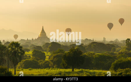 Air balloons over Buddhist temples at sunrise in Bagan, Myanmar. Stock Photo