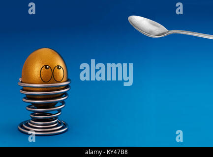 Cracking gold egg. Financial investment metaphor. Stock Photo