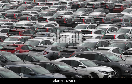 General view of new Honda cars lined up at Southampton Docks prior to being loaded onto a car container ship for export Stock Photo