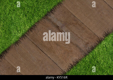 Composite image of white line diagonal and grass Stock Photo