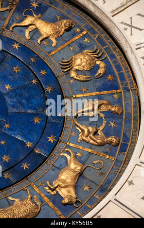 Ancient time and Astrology. Detail of Saint Mark Square renaissance Clock Tower in Venice with zodiac signs, planet and stars (15th century) Stock Photo