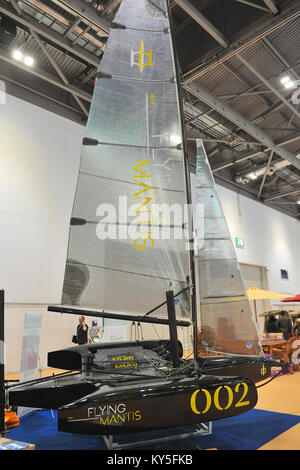 London, UK. 12th January, 2018. A Flying Mantis Carbon Fibre Trimaran on display on day three of the London Boat Show at the ExCeL Exhibition Centre. More than 230 boats and vessels from 347 exhibitors, ranging from extravagant luxury motor yachts to small dinghies and boats, greeted buyers and enthusiasts attending the 64th London Boat Show which is taking place at the ExCeL Exhibition Centre, London United Kingdom. Credit: Michael Preston/Alamy Live News Stock Photo