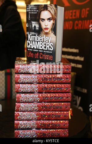Romford Essex, UK. 13th Jan, 2018. Crime author Kimberley Chambers signs copies of her 13th and latest book Life of Crime at waterstones bookshop Romford Essex photo Credit: SANDRA ROWSE/Alamy Live News Stock Photo