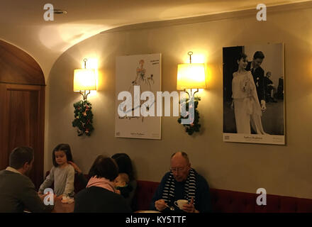 Morges, Switzerland. 07th Jan, 2018. Posters in a café depicting the actress Audrey Hepburn, who enjoyed shopping there, in Morges, Switzerland, 07 January 2018. Hepburn died aged 63 in Switzerland, where she had been living for more than 30 years. Credit: Christiane Oelrich/dpa/Alamy Live News Stock Photo