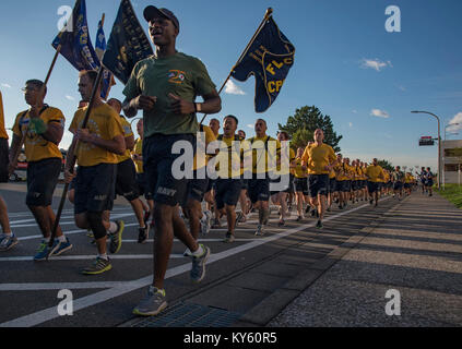 YOKOSUKA, Japan (Sept. 13, 2017) Chief Petty Officers and Chief Petty Officer Selectees from Yokosuka area commands take part in a formation run with Master Chief Petty Officer of the Navy Steven S. Giordano onboard Commander Fleet Activities Yokosuka. In addition to the run, Giordano had lunch with Sailors at the base galley and held an all hands call at the Fleet Theater. (U.S. Navy Stock Photo