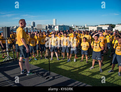 YOKOSUKA, Japan (Sept. 13, 2017) Master Chief Petty Officer of the Navy Steven S. Giordano takes questions from Chief Petty Officers and Chief Petty Officer Selectees from Yokosuka area commands after a physical training (PT) session at Berkey Field onboard Commander Fleet Activities Yokosuka. In addition to PT, Giordano had lunch with Sailors at the base galley and held an all hands call at the Fleet Theater. (U.S. Navy Stock Photo