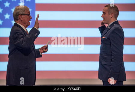 U.S. Air Force 2nd Lt. Christopher Wright takes the oath of office during his commissioning ceremony, Dec. 20, 2017. Clemson University's Army and Air Force Reserve Officer's Training Corps units held a joint commissioning ceremony in the Tillman Hall auditorium. U.S. Army Brig. Gen. Stephen B. Owens, director of the joint staff, South Carolina National Guard, was the featured speaker. ( Stock Photo