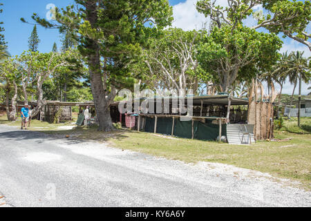 TADINE,MARE,NEW CALEDONIA-DECEMBER 3,2016: Rustic structure with locals selling food and drink to tourists at Yejele Beach in Mare, New Caledonia Stock Photo